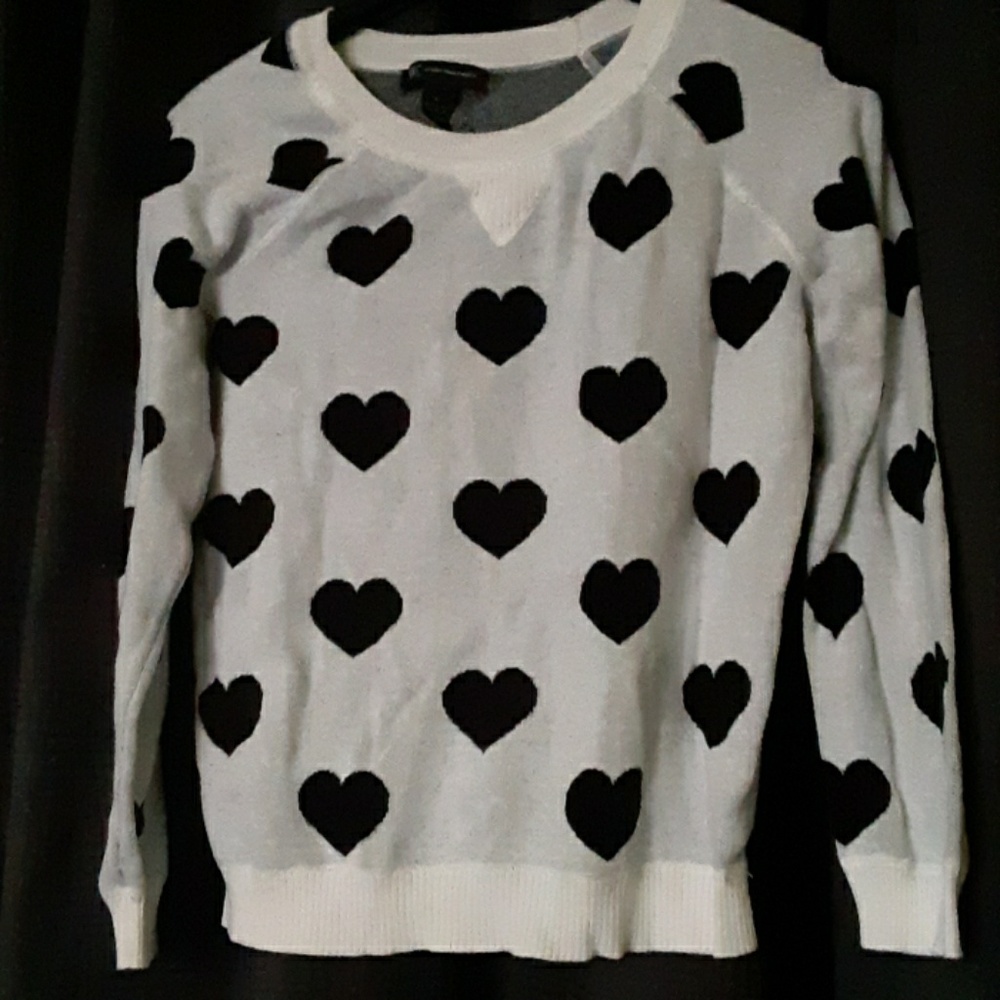 HEART SWEATER INC